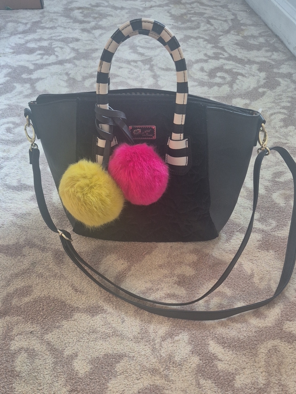 Black Women's Satchel Tote with Striped Handles and Pink & Yellow Fur Pom Poms